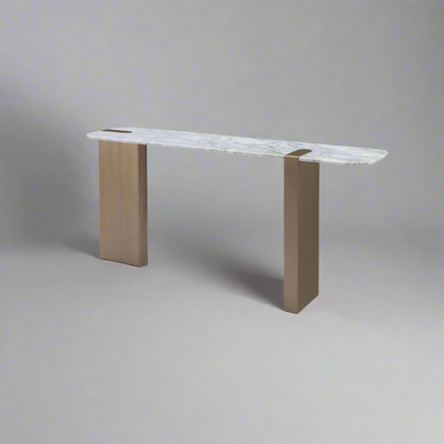Modern console table with marble top and metal legs on a white background